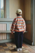 Konges Slojd kurtka dziecięca teddy Jody Tangerine Stripe – Chwali Piętka